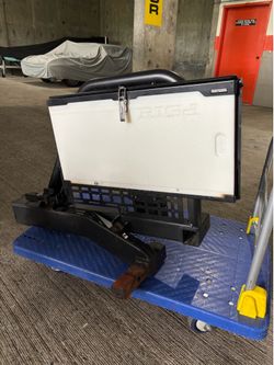 Swing out tire carrier