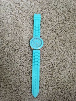 Gold and silver Teal aqua watch. Needs battery