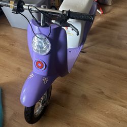 Razor Pocket Mod Betty electric scooter in purple