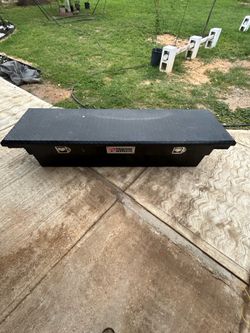 Crossover truck tool box