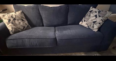 Couch and love seat with 4 pillows