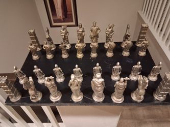 1960 vintage chess pieces Italian made cast Roman's vs Balbrian  in  silver &bronze  pewter