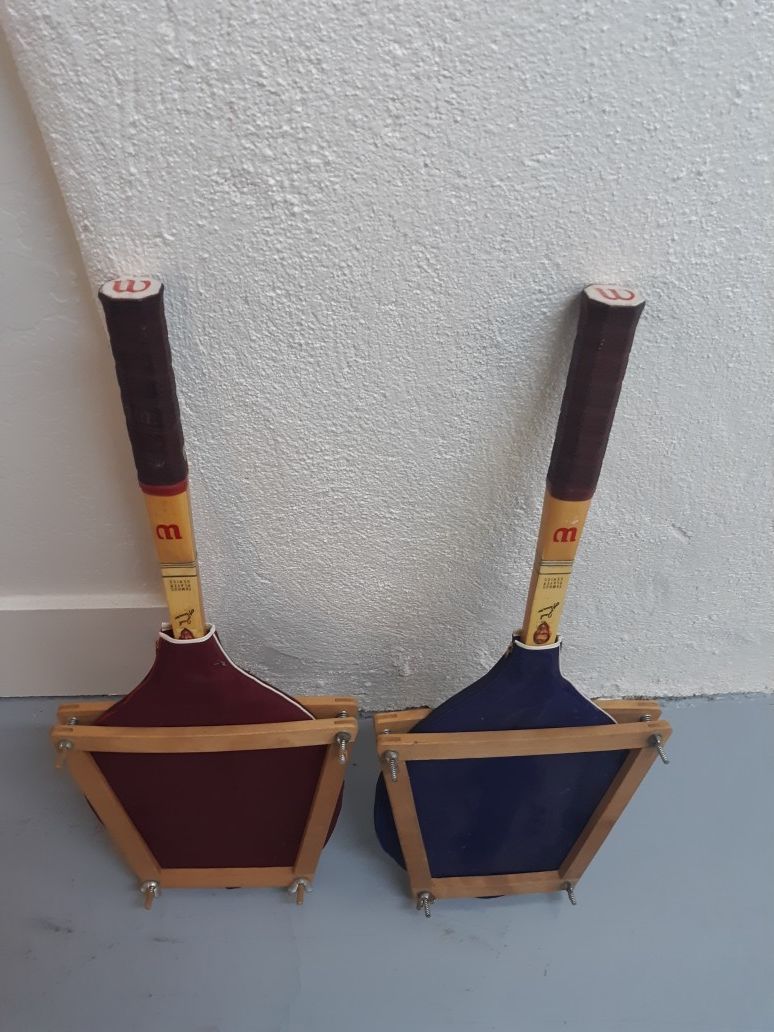 Vintage tennis rackets with guards