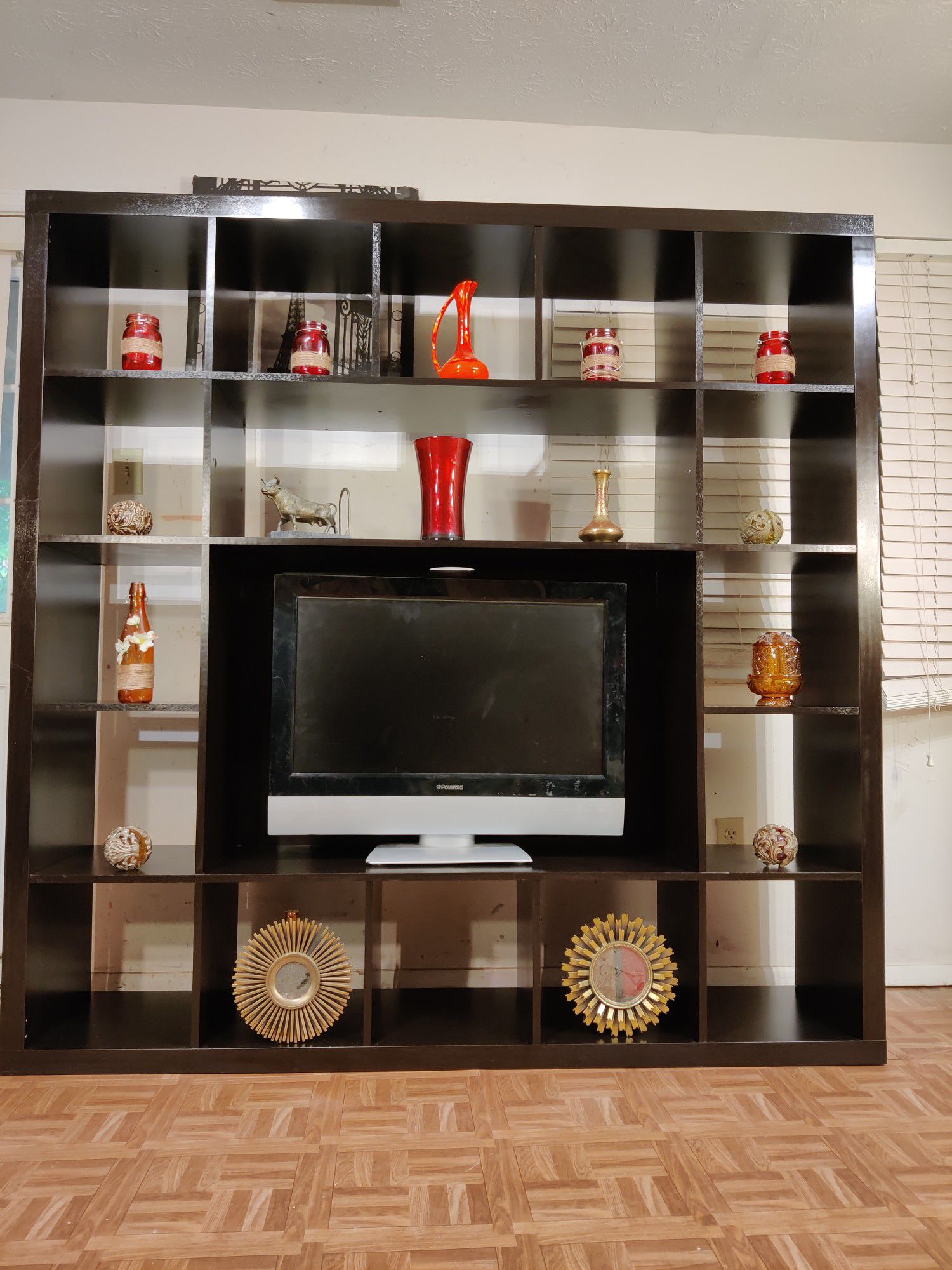 Nice TV stand/entertainment center with many shelves in good condition, we can take it part for easy pickup, driveway pickup. L72"*H72"