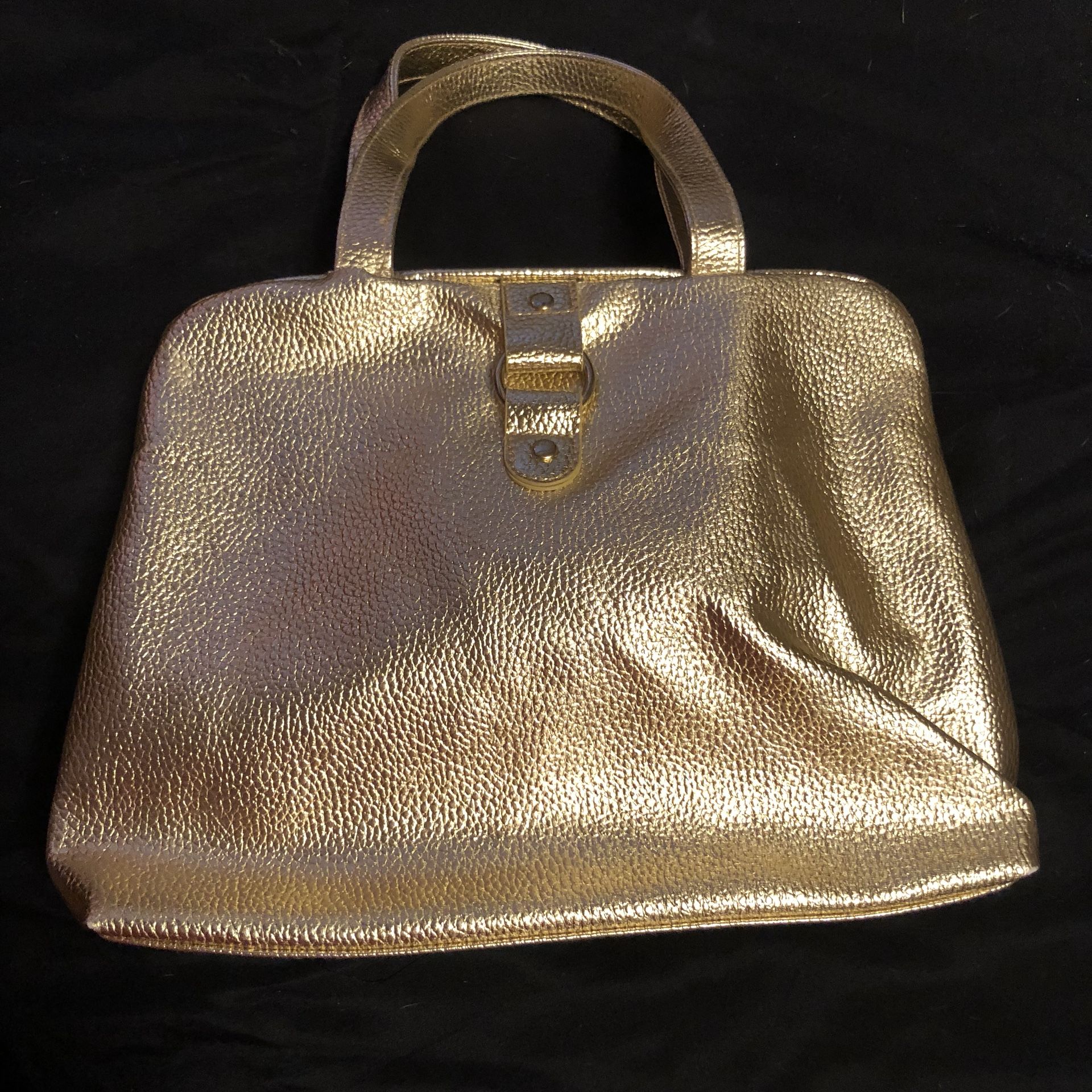 New gold toiletry/makeup bag that snaps closed