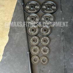 NEW CAST IRON PLATES SET WITH OLYMPIC BAR
