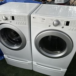 LG Tromm Super Capacity Direct Drive System, Stainless Steel Drum, Quiet Operation Washer & electric Dryer on pedestals!