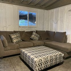 New Sectional With Pillows And Ottoman