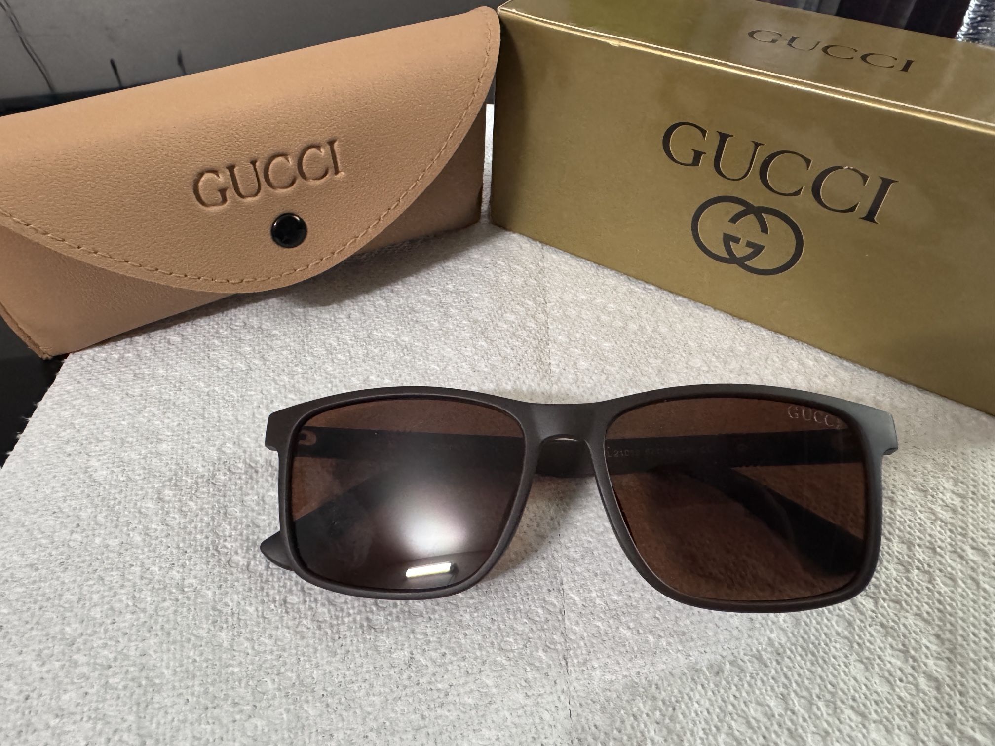 Gucci Sunglasses – Matte Black Frame with Brown Lenses