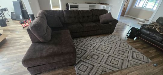 Brown L - shape couch