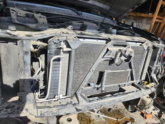 214 Chevy COMPLET SET RADIATOR CONDENSER RADIATOR SUPORT ALL READY TO INSTALL