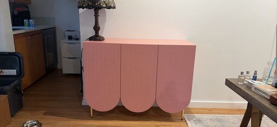 Chic light pink sideboard