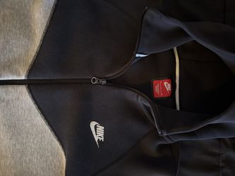 Black and Gray Nike tech