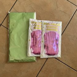 2 Green Plastic Tablecloths And 2 Pink Foil Curtains
