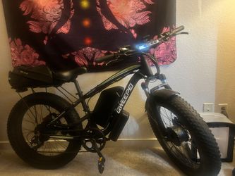 Electric e-bike it's a black dual Drive QWEEPEI
