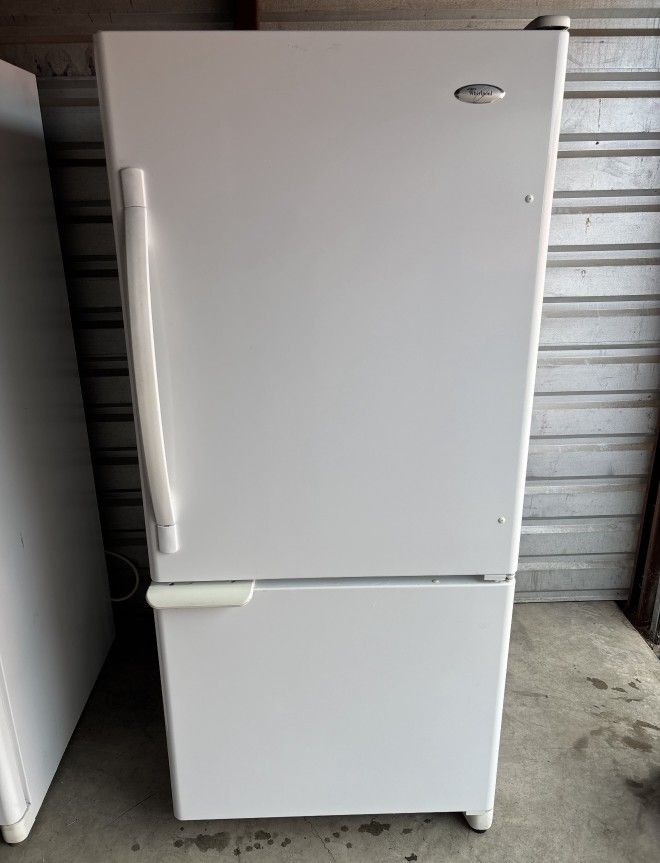 White Whirlpool Refrigerator And Freezer