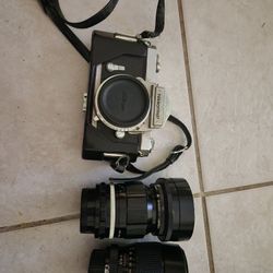 Nikkormat Camera And Lenses