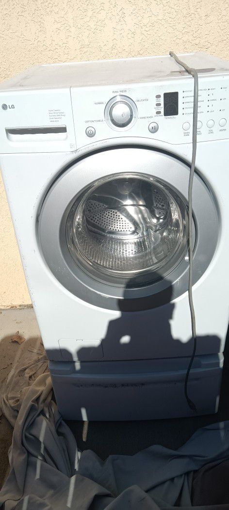 Washer & Dryer   Lg / Washer Works Good ,Dryer Doesn't Dry Very Good 