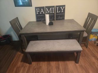 Sturdy table 2 chairs and bench great condition
