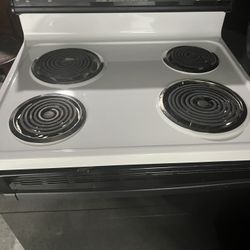 Stove, Dishwasher And Over The Range Microwave 