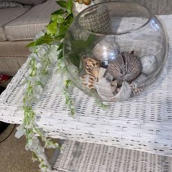 rounded glass bowl filled with an assortment of sea shells. Beautiful great looking  vase to relax your place  clear   for office spa home center piec