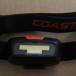 Coast LED headlamp with batteries