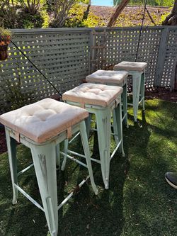 4 outdoor stools with cushions
