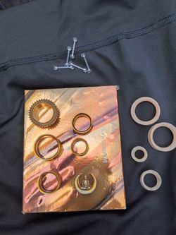 Gold toned Ear tunnels and plugs
