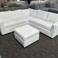 White Ivory Sectional And Ottoman 