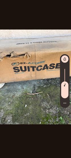 Suitcase wheelchair assemble ramp