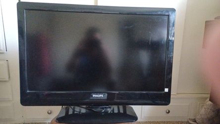 Phillips (27 1/2W X 15 1/2 ) Color TV. (See Details)