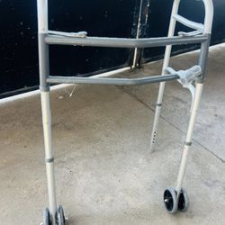 Walker With Rollers Like New 