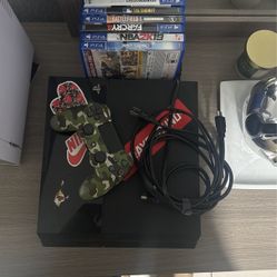 Ps4 with game and controllers
