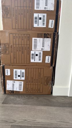 Unopened box of dining chairs