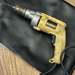 Dewalt 
DW235G VSR DRILL/Driver 1/2IN

7.8 A Power Rating, 1/2 in, 13 mm Chuck Size, Maximum Speed: 850 rpm, Reversible, 4.2 lb Tool Weight 

Helical-