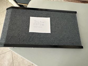 Fold up carpet dog ramp.