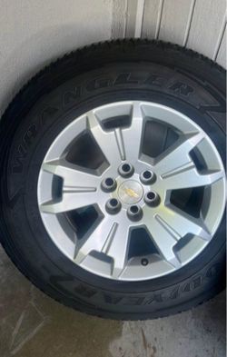 Chevy rims and Goodyear tires