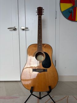 Vintage starcaster Acoustic Guital with a Stand