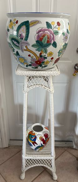 Vintage Rattan Two Levels High Table/Planter. 39” (H). Bottom : 13” (W) x 13” (D) Top: 11” x 11”. Available in Coral Gables. Cash please.