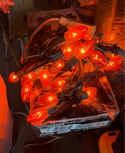 LARGE AMOUNT OF HALLOWEEN LIGHTS WITH SOME STACKS FOR THE FLOOR