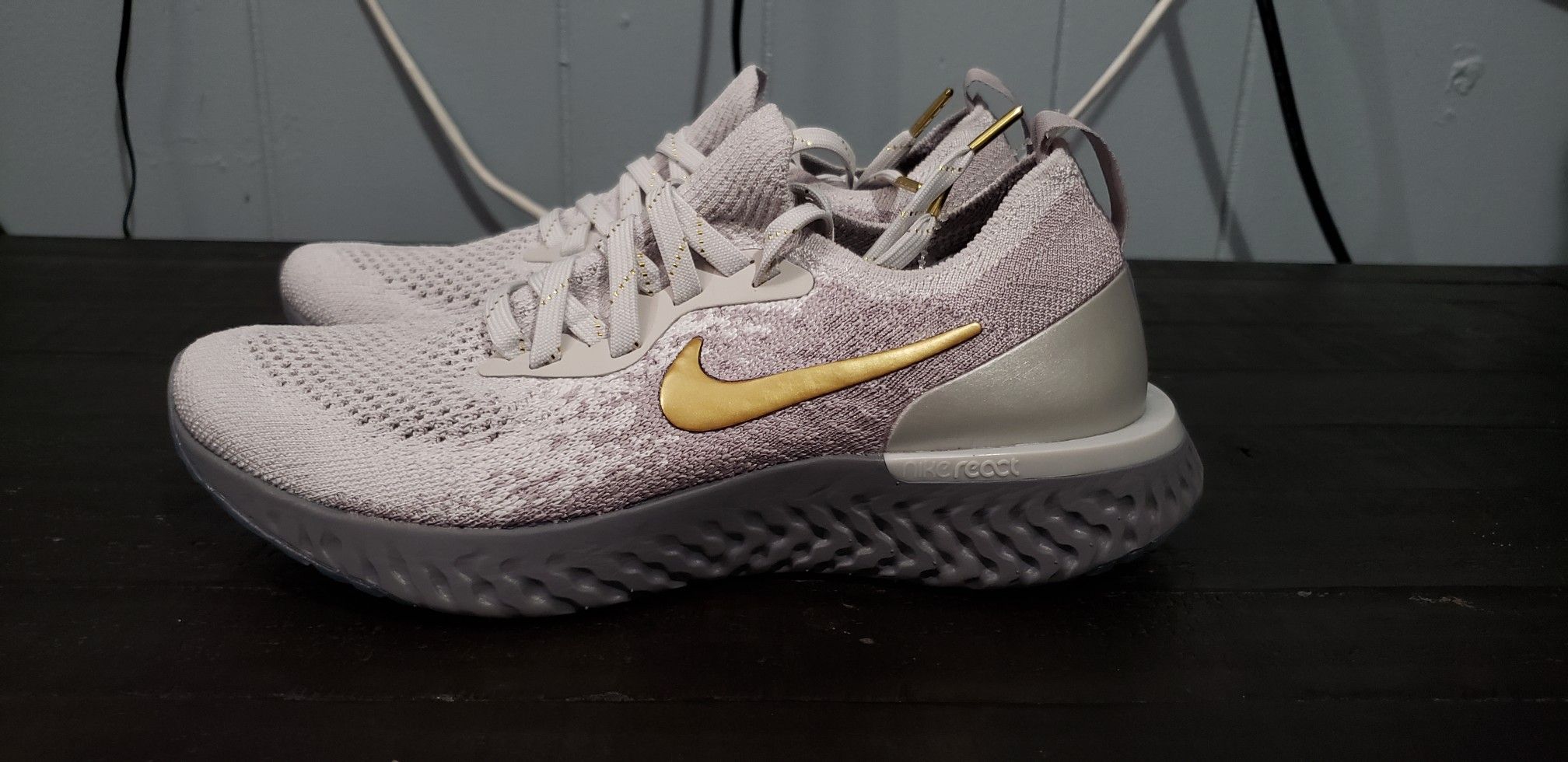 Nike Epic React Flyknit size 5.5 womans