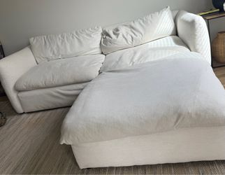 White modular sectional sofa + oversized ottoman