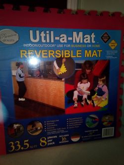 Util-a-mat child safe reversible mat.....four complete packs 8 pieces per pack/ each pack measuring 33.5 sq ft. Unopened packs $15, opened $10