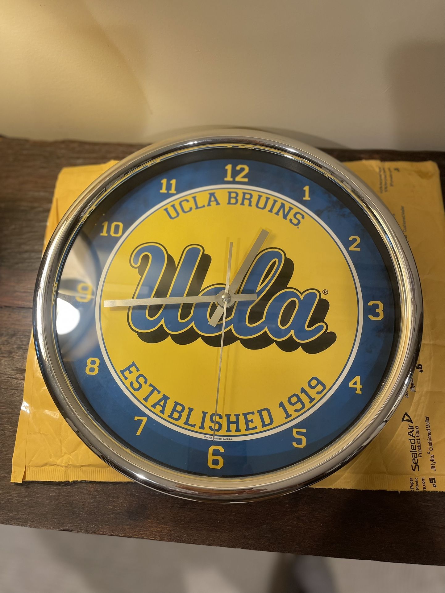 UCLA Clock Blue And Yellow, Silver Trim  12 Inch Diameter 
