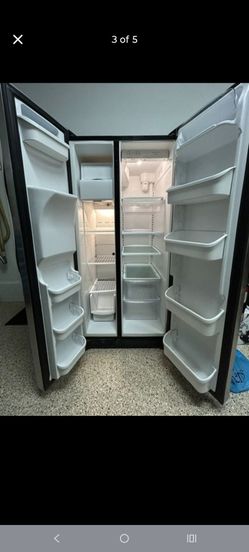 Stainless stove and side/side fridge