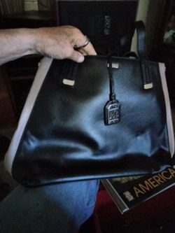 $25! Has purse tag ! Black Ralph Lauren handbag new!