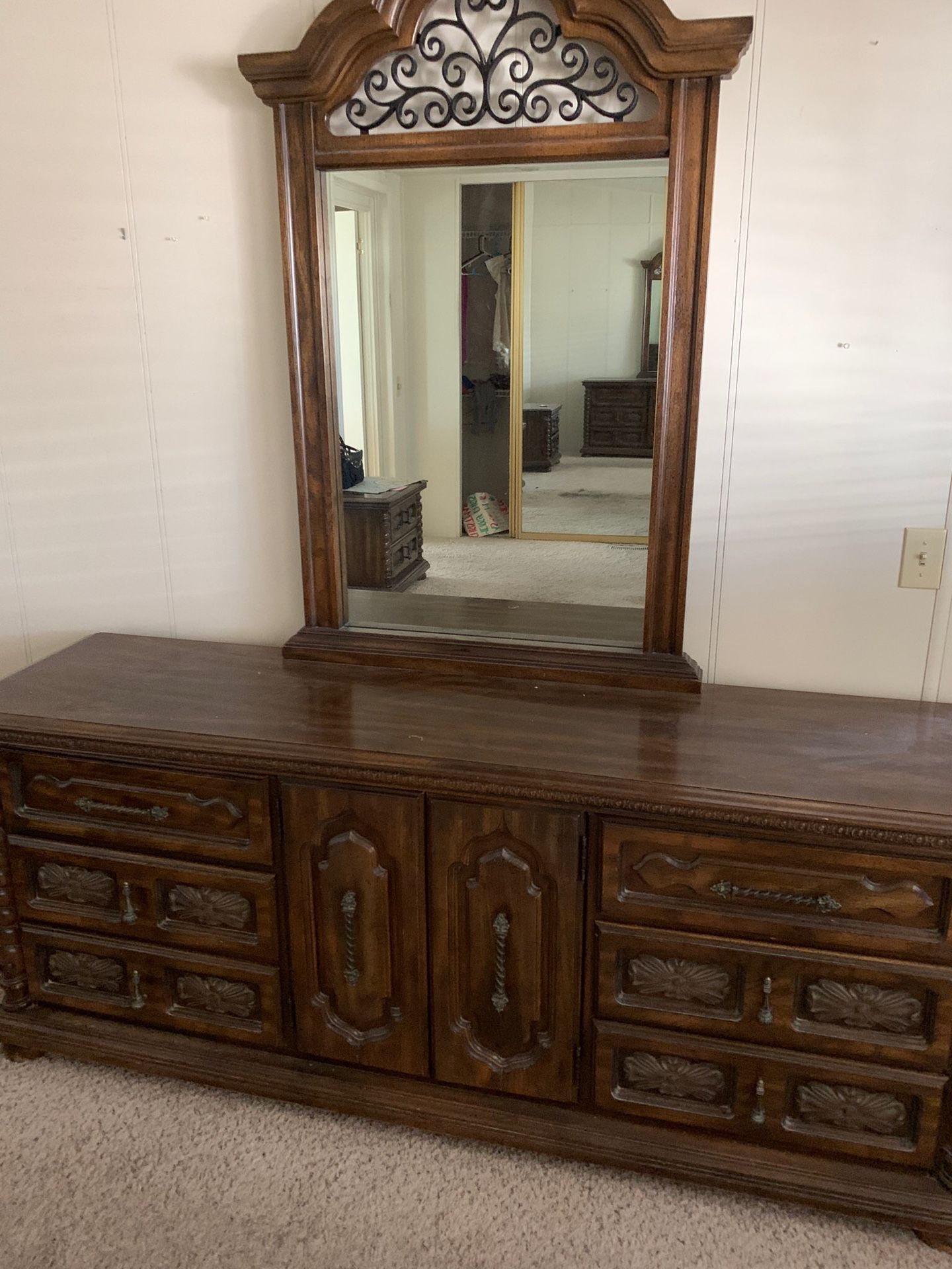 Super nice bedroom set Long dresser 2night stands and an armor this a super nice solid wood