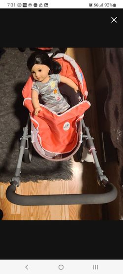 Girls toy stroller doll includes doll but can sell stroller only