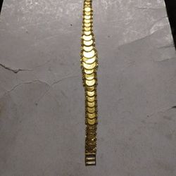 21 Carat Coin Bracelet Lent 8 Used