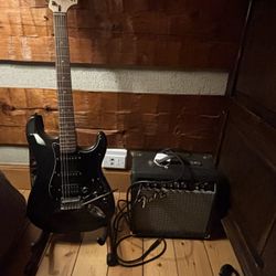 Fender Stratocaster With Amp